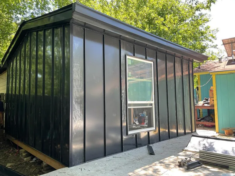 Black standing seam metal wall panels for Roof Inspection in Rapid City