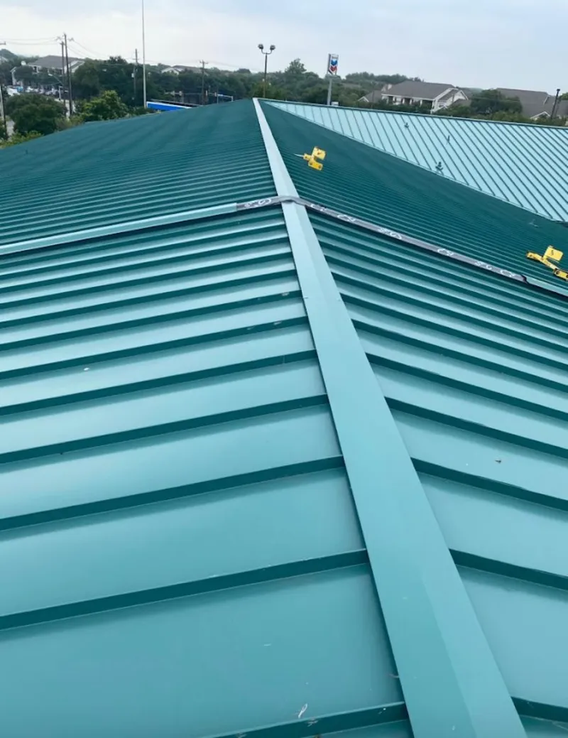 Green commercial metal roof ridge and valley for Metal Roof Repair in Rapid City